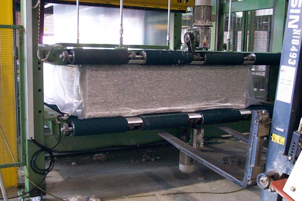 Compressive wrapping machines